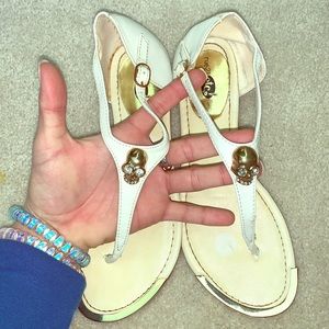Size 6/7 white sandals with gold Skull from Rue 21